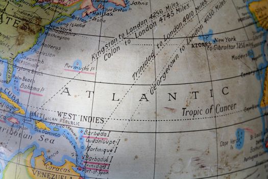 Atlantic ocean on an old dirty toy globe.