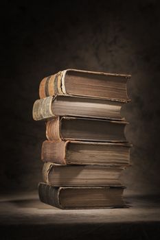 A Stack of old worn and tattered books.