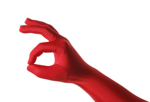 Hand in a red glove against white background.