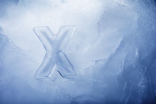 Letter X made of real ice.