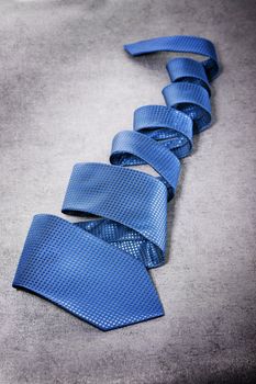 Blue silk necktie on a spiral
