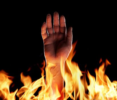 Hand sticking up from flames.