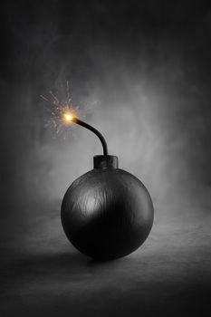 A Cartoon-style round black bomb with a burning fuse.