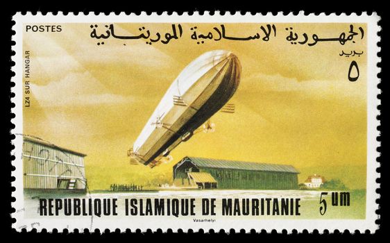 MAURITANIA - CIRCA 1976: Stamp depicting Zeppelin LZ74 airship. Circa 1976 in Mauritania