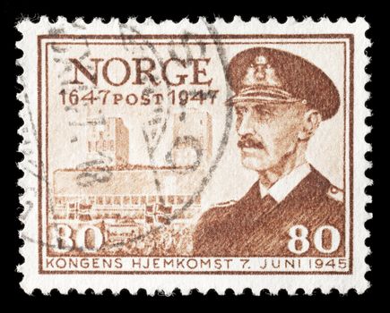 NORWAY - CIRCA 1947: Commemorative stamp celebrating the King Haakon VI's return to Norway in 1945. circa 1947 in Norway