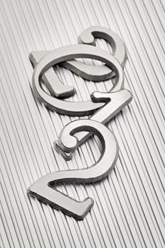 Metallic letters that can be used for number "2012" on metallic background.