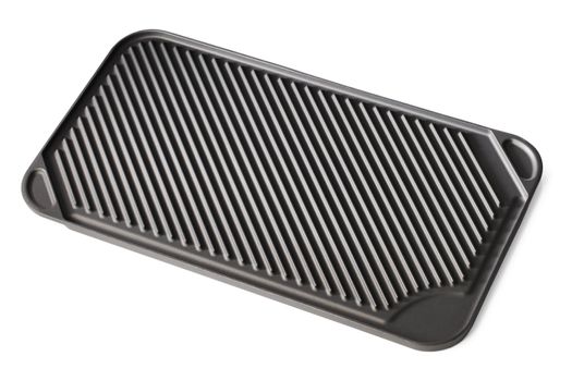 Stovetop grill pan with non-stick ceramic surface isolated on white with natural shadows.