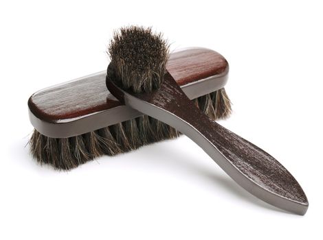 Brushes used for shoe care: Shoe dauber for applying the polish and a shoe polishing brush.