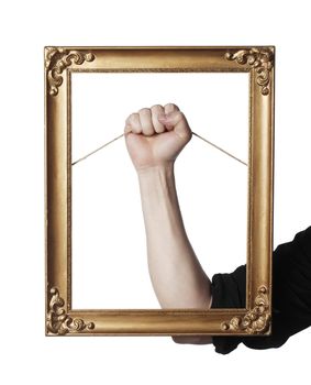 Man holding an old golden picture frame