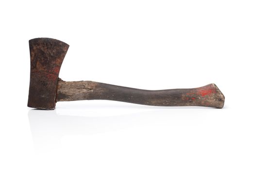 Old small axe on reflective background