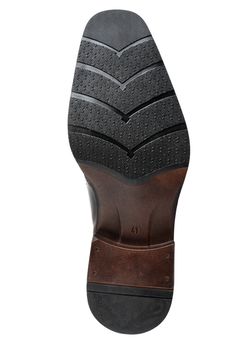 Rubber sole of a men's shoe.