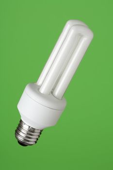 Energy saving bulb with green background