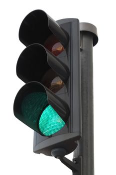 Traffic lights with the green light lit.