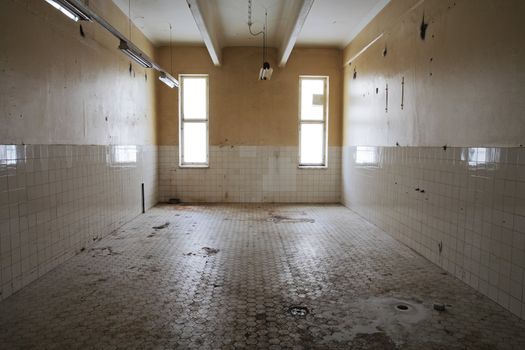 Old tiled room in an old abandoned factory