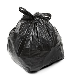 Black plastic trash bag on white