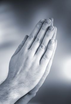 Hands clasped together for a prayer