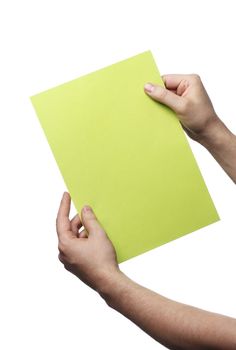 Man holding a green paper sheet