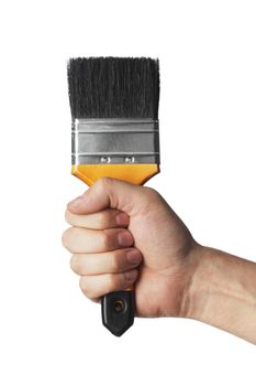 Hand holding a clean new paint brush with a firm grip