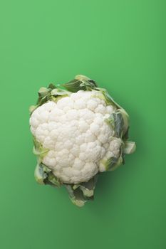 Cauliflower vegetable Brassica oleracea on green background