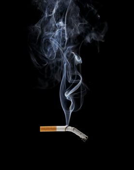 A Smoking cigarette on black background