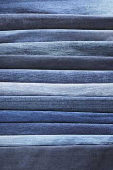 Different shades of blue jeans denim fabrics.