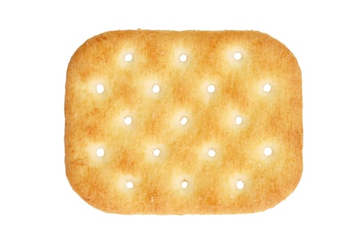 A salty cracker isolated on white