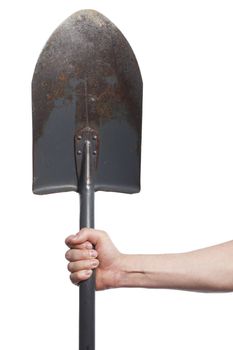 Man holding a worn metallic spade