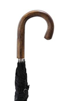 Old wooden umbrella handle against white background.