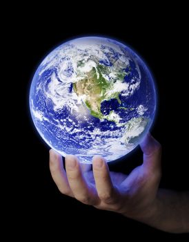 Man holding a glowing earth in his hand. Earth image provided by NASA.