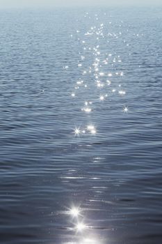 Sun reflecting from the surface of a lake.