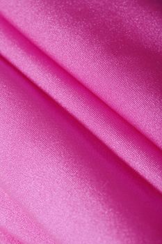 Fuchsia colored lycra/spandex fabric. Short depth-of-field