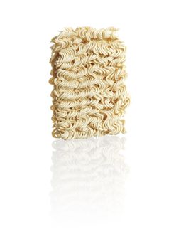 A block of dried instant ramen noodles