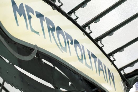 Old Art Nouveau sign for Paris Metropolitain rapid transit metro system.