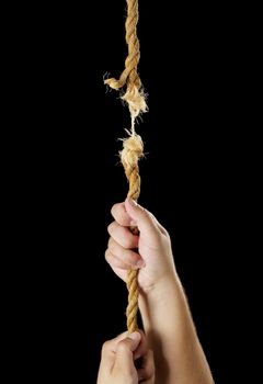 Man climbing a breaking rope