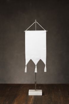 a blank white table flag on table.