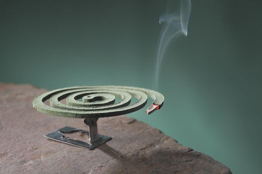 Mosquito coil is mosquito-repelling incense, usually shaped into a spiral, and typically made from a dried paste of pyrethrum  powder.