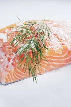 Scandinavian cuisine. Sugar and salt cured salmon "gravlax" with dill