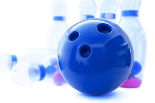 pins and ball for play in bowling on a white background