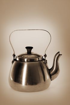 Old metallic coffee pot, sepia toned