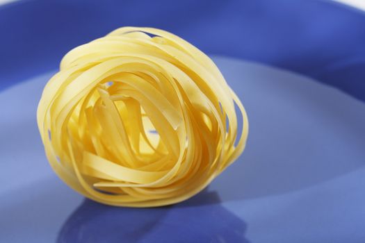 A Bunch of dried pasta tagliatelle