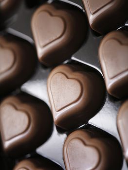 Heart-shaped chocolates in a box