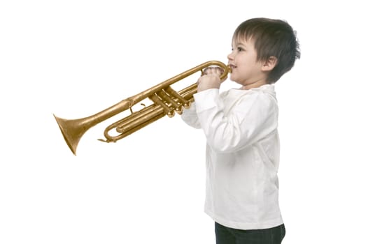 Boy playing on a trumpet isolated over white background
