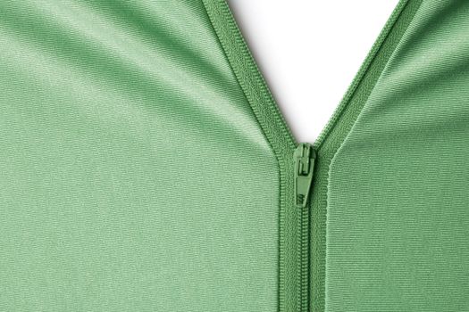 Opening of a green zipper reveals white background