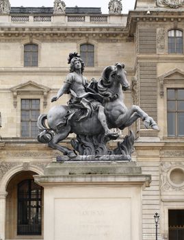 Equestrian statue of king Louis XIV in the courtyard of the Louvre museum. Made by Gian Lorenzo Bernini (1598-1680)