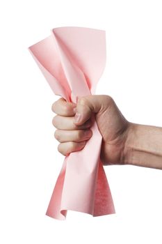Hand crumpling a pink paper