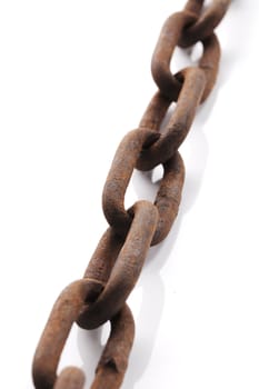 Old rusty chain on white background with natural shadows.