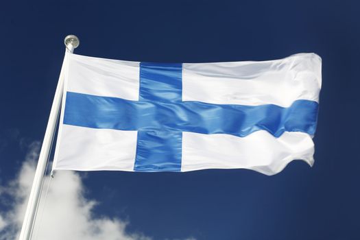 The National flag of finland waving in the wind.