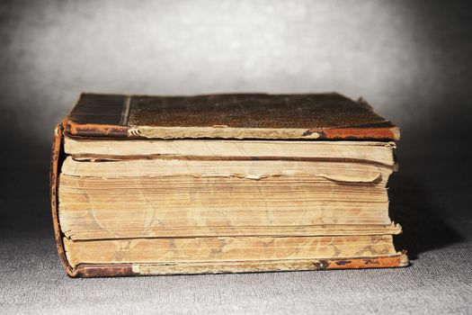 Old worn and yellowed book