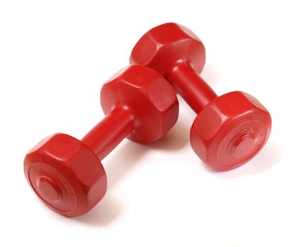 Small red 1,5kg (3 lbs.) plastic dumbells on white