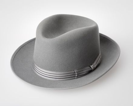 Old vintage felt hat on light grey surface